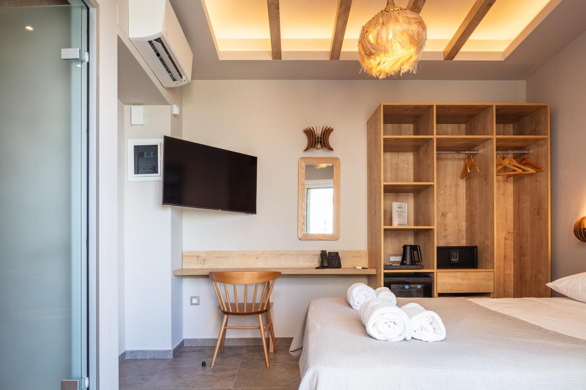 Skipper Beachfront Suites Khersónisos Rom bilde